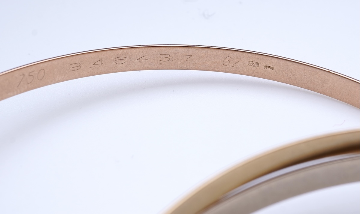 Cartier, a gold bangle, 'Trinity de Cartier'